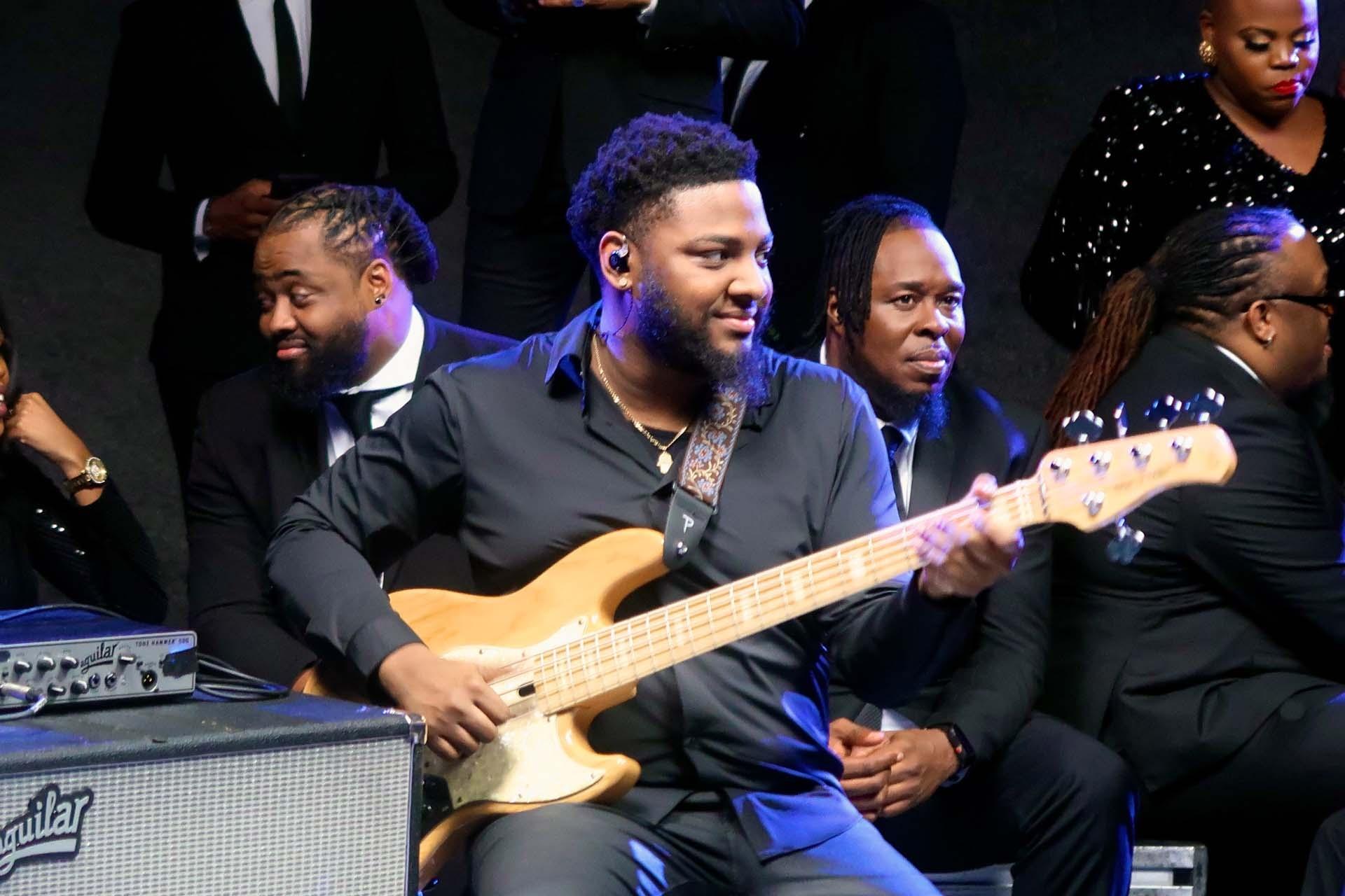 Bassist, Joshua Easley, Jr. performs "Total Praise" on the set for GOSPEL with The Belle Singers