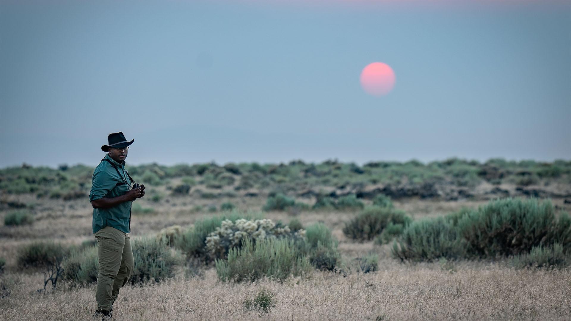 Shane stands in a Nevada desert.