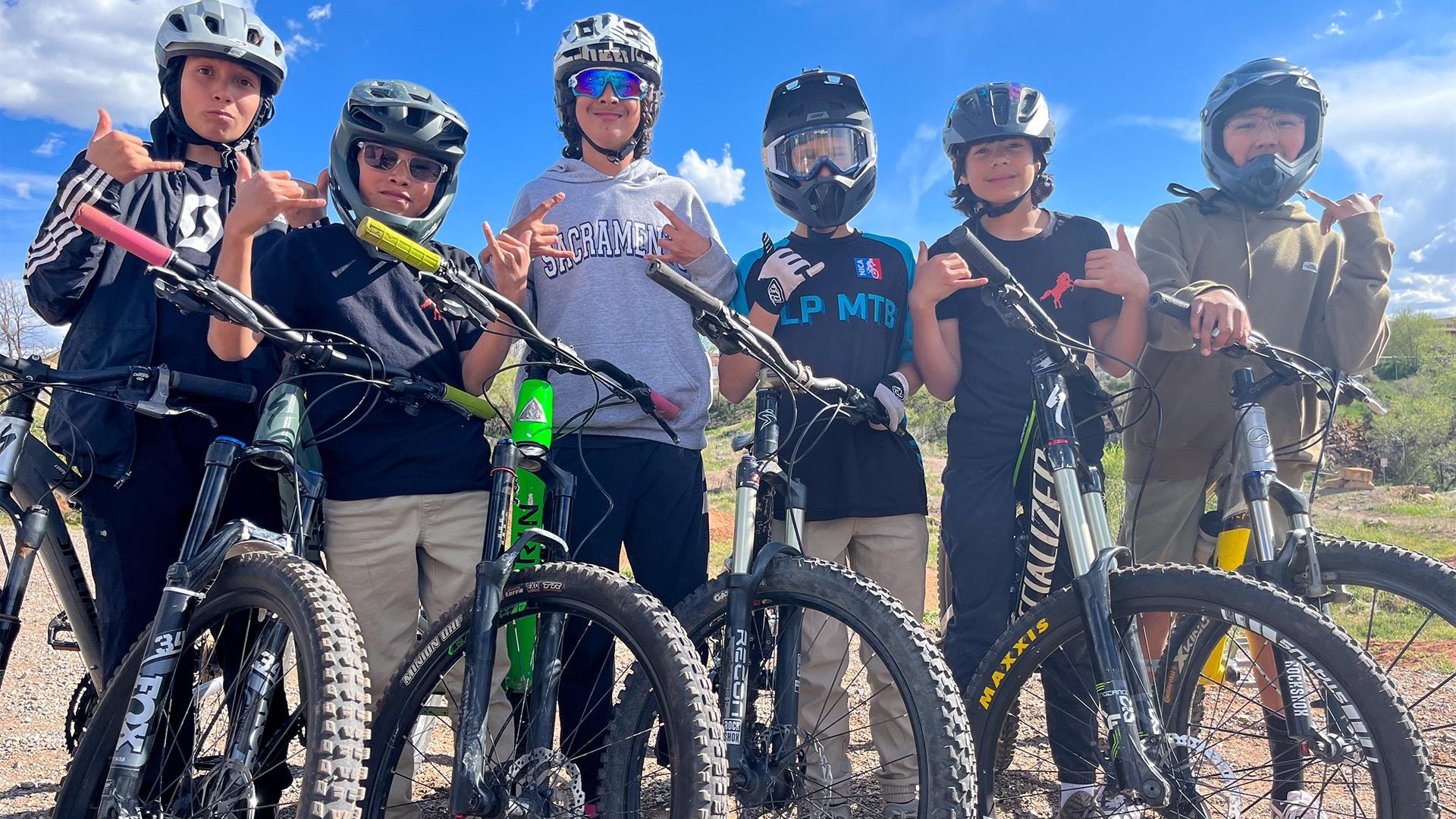 Six kids on mountain bikes